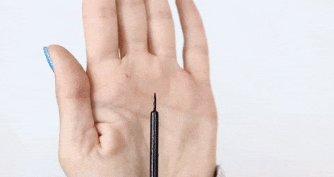 applying magnetic eyeliner and lashes